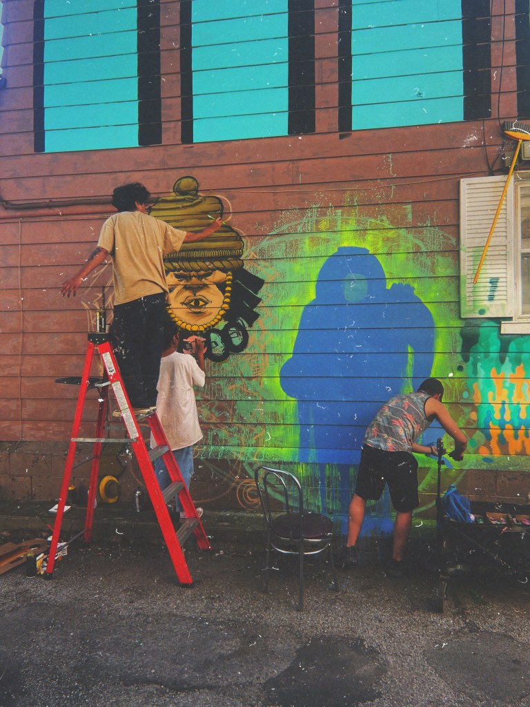 Artists Mac the Maker, Sowl & OBLSK hard at work.
